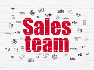 pazarlama kavramı: duvar arka plan üzerinde satış ekibi