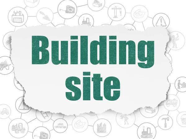 Het concept van de bouw van gebouw: bouwterrein op gescheurd papier achtergrond — Stockfoto