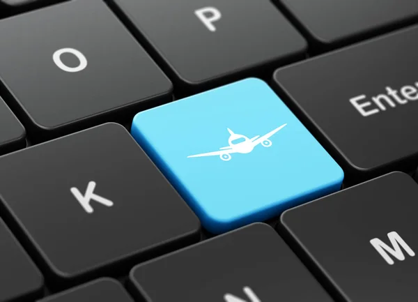 Concetto turistico: aereo su sfondo tastiera del computer — Foto Stock