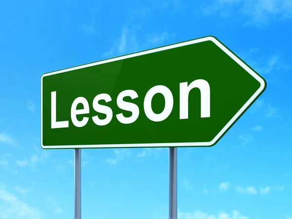 Concept d'apprentissage : Leçon sur fond de panneau de signalisation routière — Photo