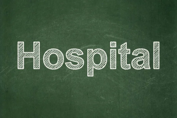 Healthcare concept: Hospital on chalkboard background — Stock Photo, Image