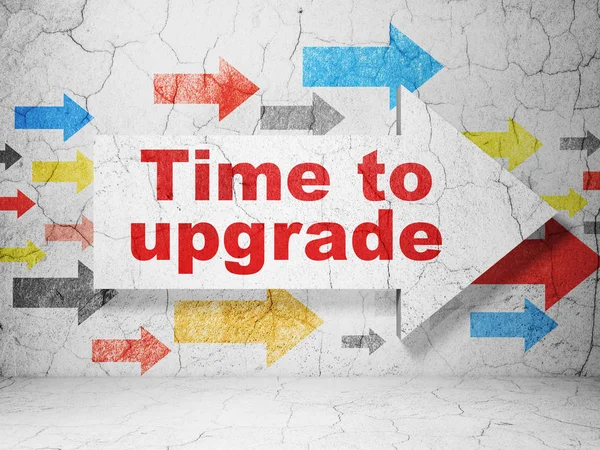 Time concept: arrow with Time To Upgrade on grunge wall background — Stock Photo, Image