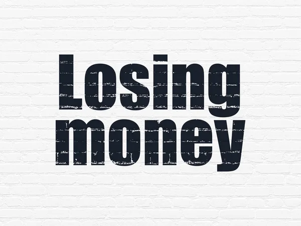 Currency concept: Losing Money on wall background