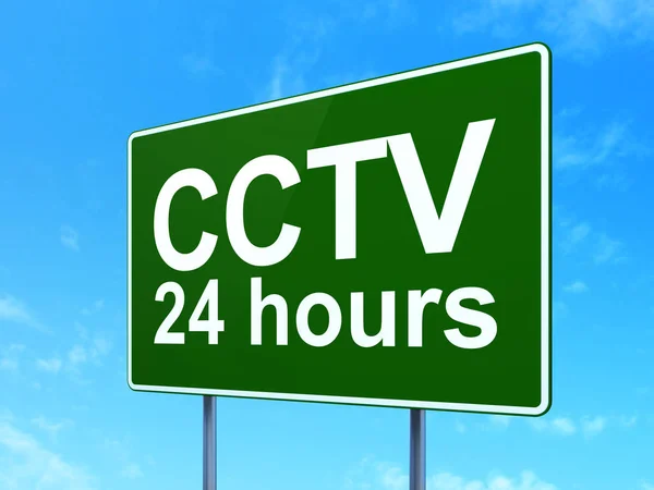 Privacy concept: CCTV 24 hours on road sign background — Stock Photo, Image