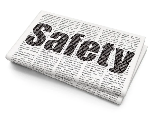 Veiligheidsconcept: veiligheid op de achtergrond van de krant — Stockfoto