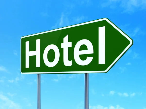 Conceito de turismo: Hotel em fundo sinal de estrada — Fotografia de Stock