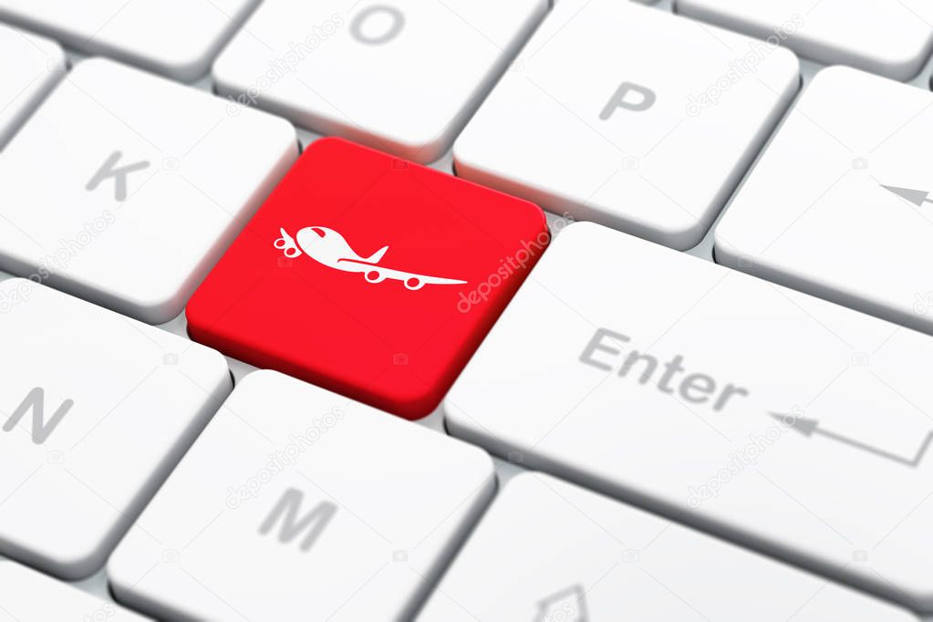 Vacation concept: Airplane on computer keyboard background