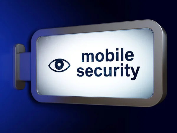 Концепция безопасности: Мобильная безопасность и глаз на фоне рекламного щита — стоковое фото
