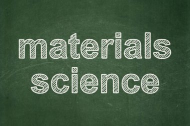 Bilim kavramı: Kara tahta arka plan üzerinde malzeme bilimi