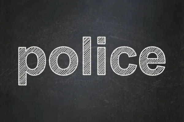 Wet concept: politie op schoolbord achtergrond — Stockfoto