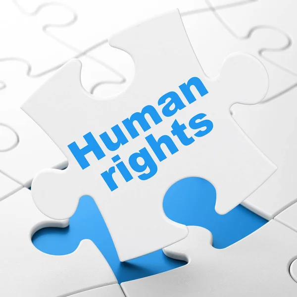 Politics concept: Human Rights on puzzle background