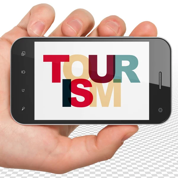 Концепція відпустки: Рука тримає смартфон з туризмом на дисплеї — стокове фото