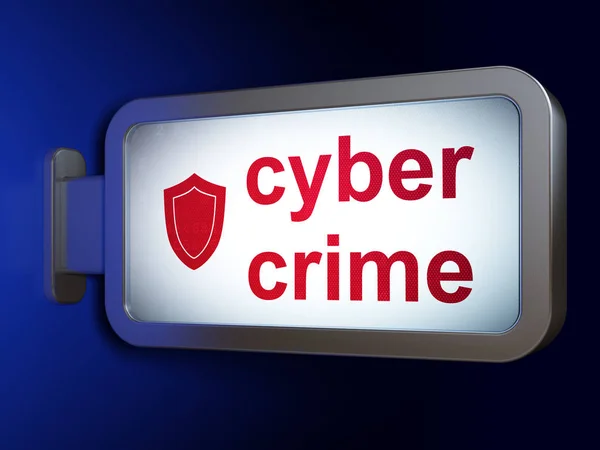 Концепция защиты: киберпреступность и щит на фоне рекламного щита — стоковое фото