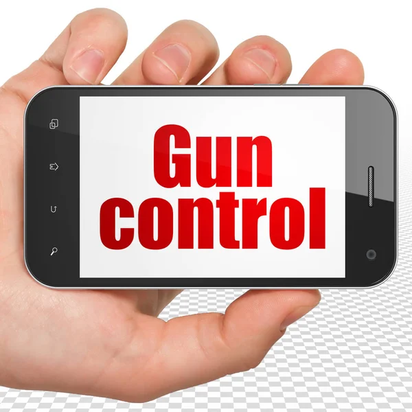 Concepto de seguridad: Smartphone de mano con control de pistola en pantalla —  Fotos de Stock