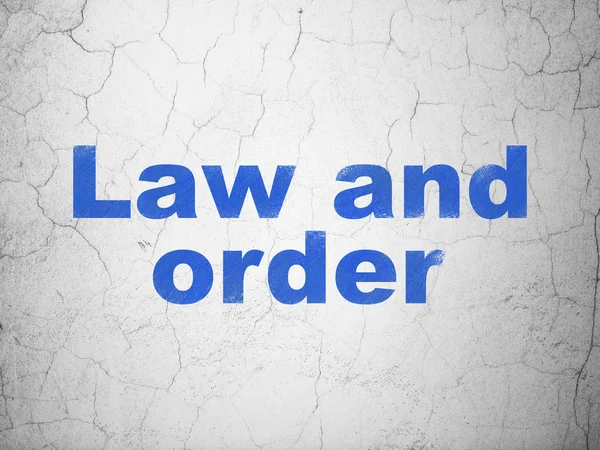 Concept van de wet: wet en orde op muur achtergrond — Stockfoto