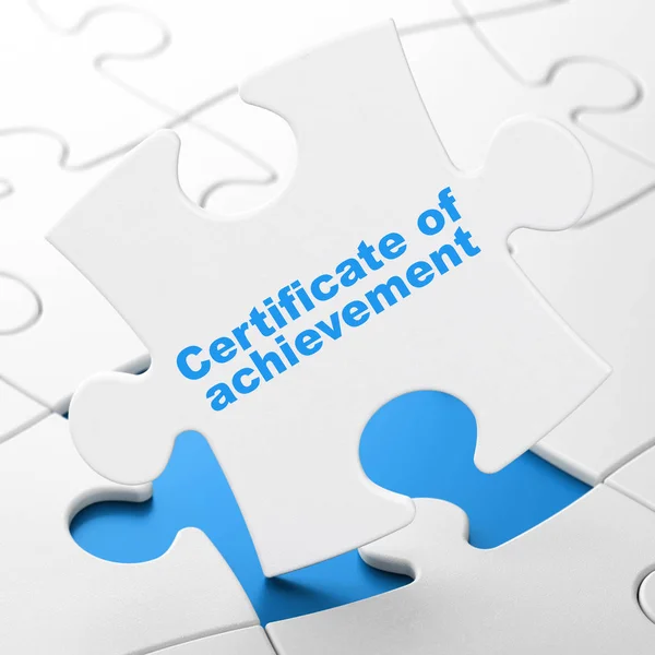 Studeren concept: certificaat van voltooiing op puzzel achtergrond — Stockfoto