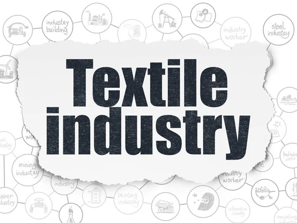 Concepto de fabricación: Industria textil sobre fondo de papel desgarrado — Foto de Stock