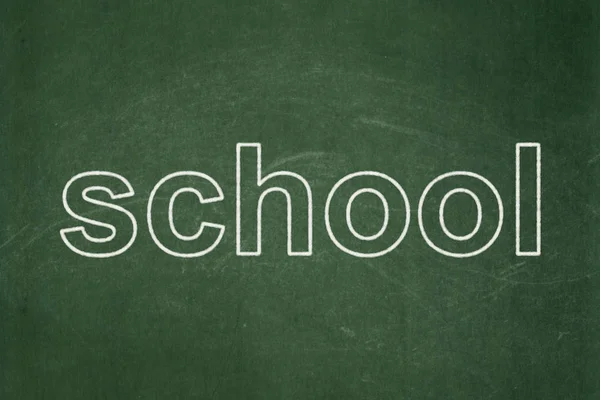 Education concept: School on chalkboard background — Stock Photo, Image