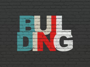 İnşaat kavramı: duvar arka planda bina