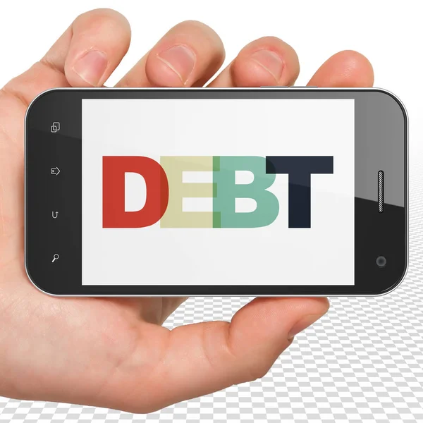 Koncept měny: ruka držící Smartphone s dluhem na displeji — Stock fotografie