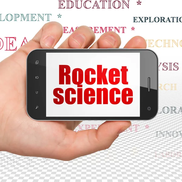 Conceito de ciência: mão segurando Smartphone com Rocket Science em exibição — Fotografia de Stock