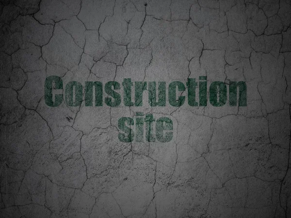Concepto de construcción: Sitio de construcción sobre fondo de pared grunge —  Fotos de Stock