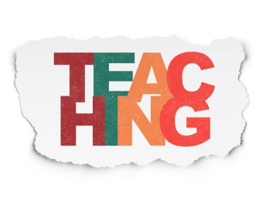 Eğitim kavramı: yırtık kağıt arka plan üzerinde öğretim