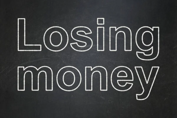 Banking concept: Losing Money on chalkboard background