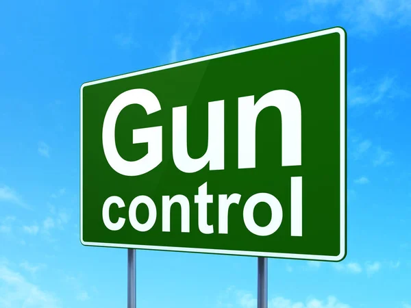 Concepto de protección: Control de pistola en el fondo de la señal vial —  Fotos de Stock