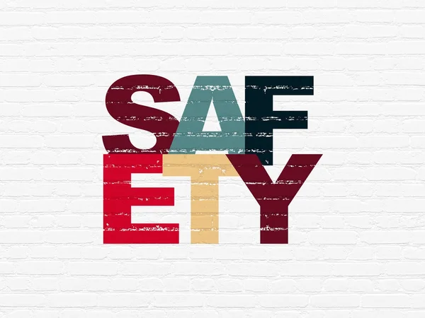 Safety concept: Safety on wall background — Stock Photo, Image