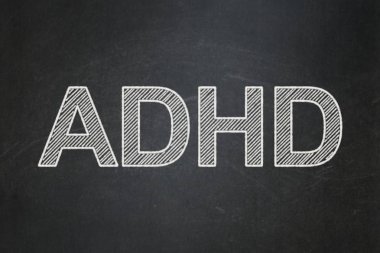 Sağlık kavramı: DEHB kara tahta arka plan üzerinde