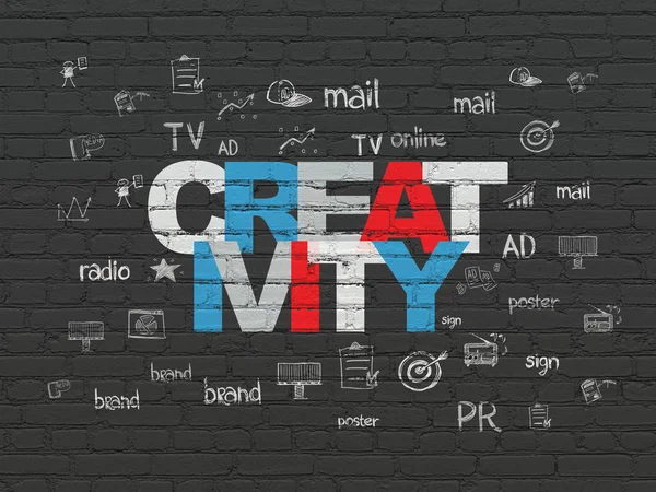 Marketing concept: Creativity on wall background