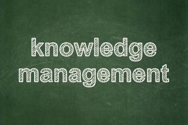 Studying concept: Knowledge Management on chalkboard background — Stock Photo, Image