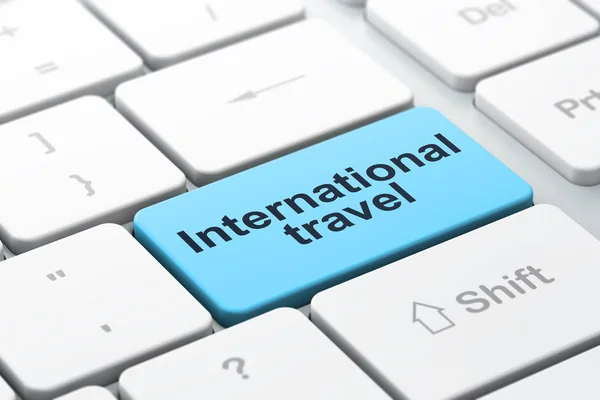 Концепция путешествий: International Travel on computer keyboard background — стоковое фото