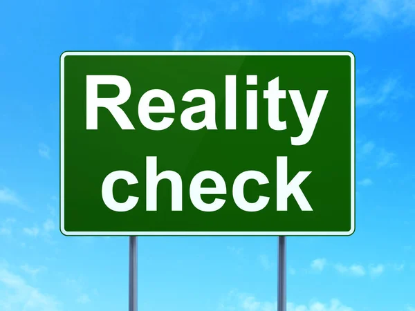 Finance concept: Reality Check on road sign background