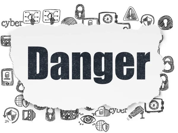Security concept: Danger on Torn Paper background — Stock Photo, Image