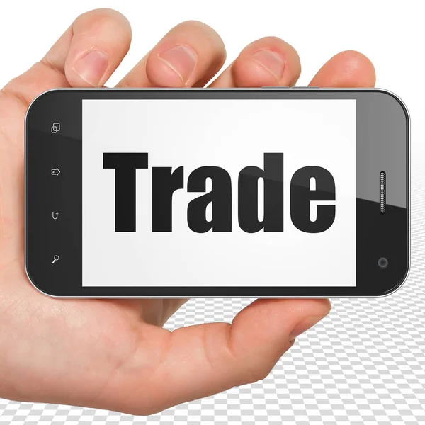 Finance concept: Hand Holding Smartphone with Trade on display — Stock Photo, Image
