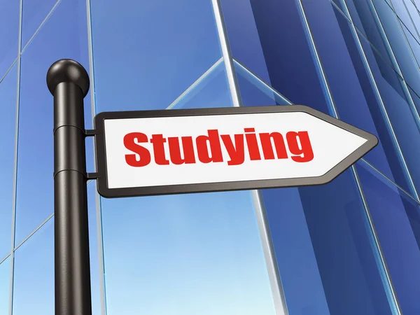 Studying concept: sign Studying on Building background — Stock Photo, Image