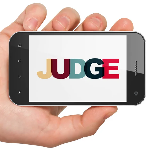 Concepto de ley: Smartphone de mano con juez en pantalla —  Fotos de Stock