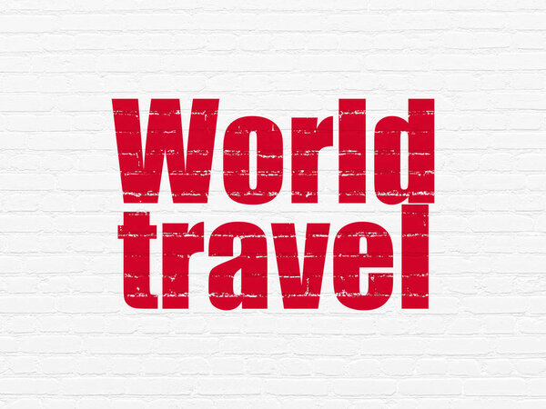 Vacation concept: Painted red text World Travel on White Brick wall background