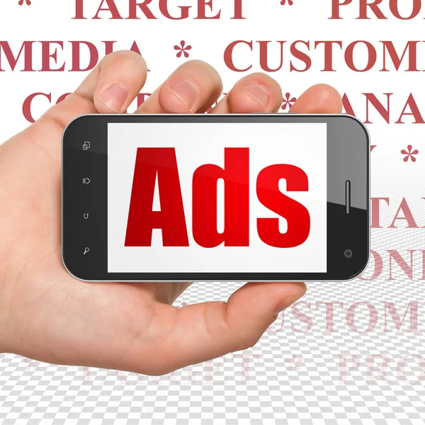 Conceito de publicidade: mão segurando Smartphone com anúncios em exibição — Fotografia de Stock