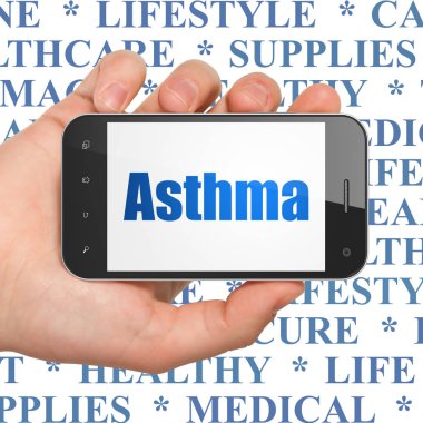 Sağlık kavramı: el Smartphone ekranda astımı olan Holding