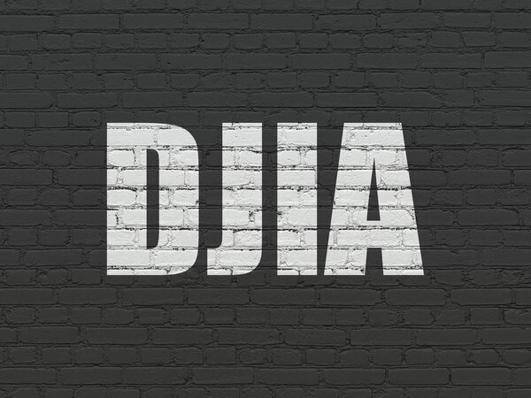 Stock market indexes concept: DJIA on wall background