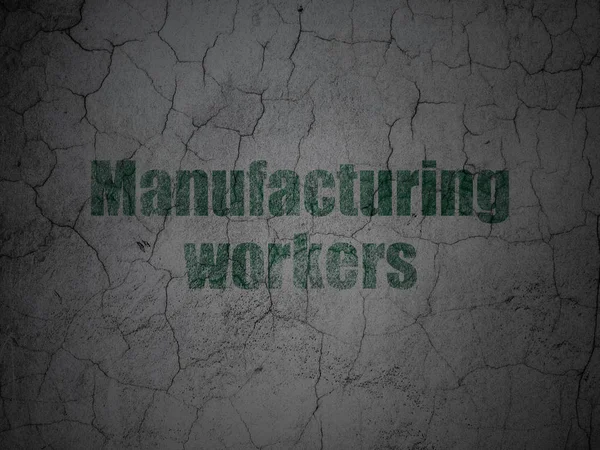 Manufacuring koncept: výrobních dělníků na grunge stěna pozadí — Stock fotografie