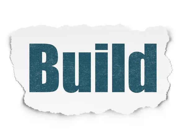 Concepto de construcción de edificios: Construir sobre fondo de papel roto —  Fotos de Stock