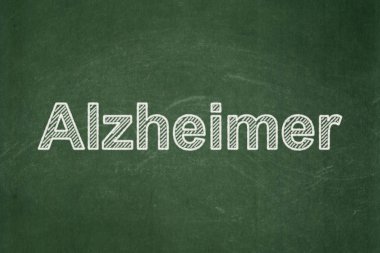 Sağlık kavramı: Alzheimer kara tahta arka plan üzerinde