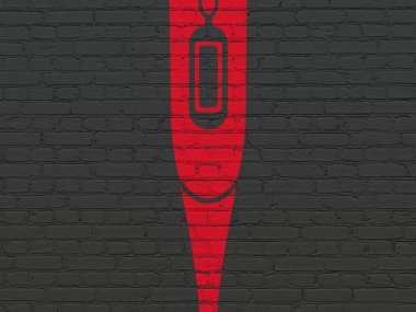 Tıp kavramı: duvar arka plan üzerinde termometre