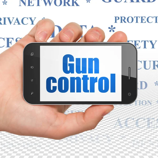 Koncepce ochrany soukromí: ruka držící Smartphone s kontrolu zbraní na displeji — Stock fotografie