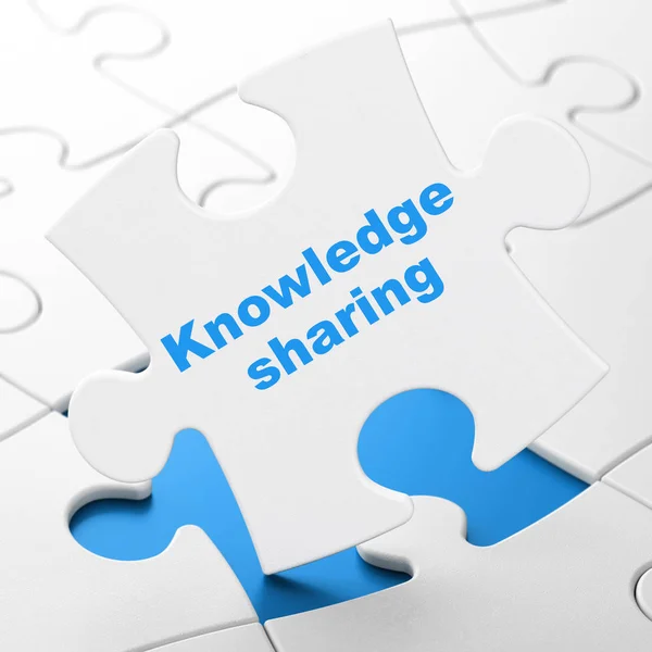 Onderwijs concept: kennisuitwisseling op puzzel achtergrond — Stockfoto