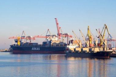 ODESSA, UKRAINE - JANUARY 02, 2017 Cargo ships entering one of the busiest ports in the world, Odessa clipart